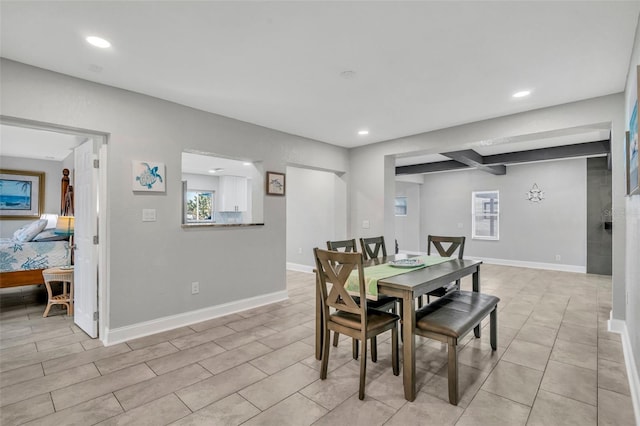 dining area featuring recessed lighting and baseboards