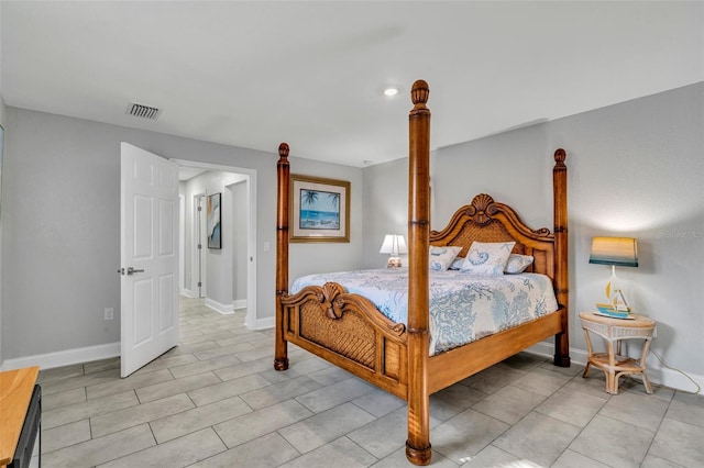 bedroom with visible vents and baseboards