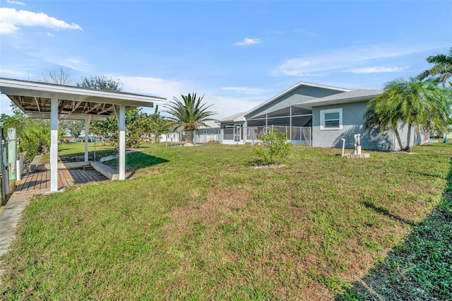 view of yard featuring a lanai