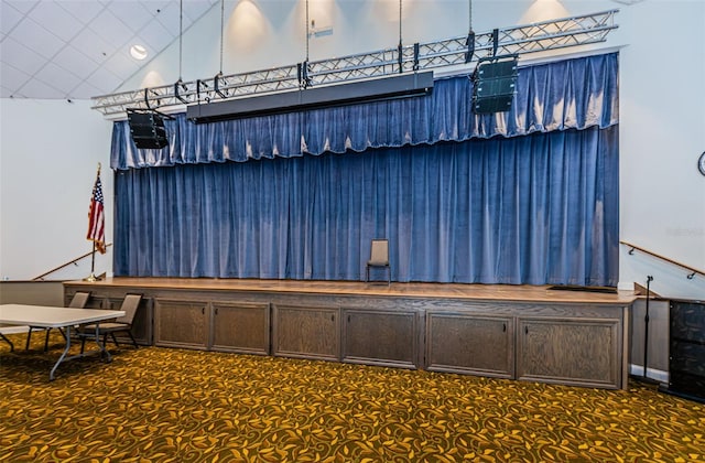 interior space featuring a towering ceiling