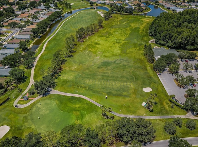 bird's eye view featuring a residential view, a water view, and golf course view