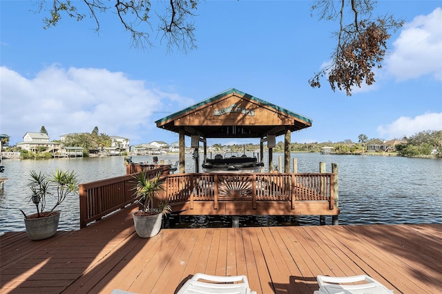 view of dock featuring a water view and boat lift