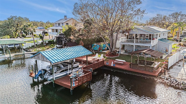 9920 Alavista Dr, Gibsonton, FL 33534 - dock featuring boat lift, a water view, and a residential view