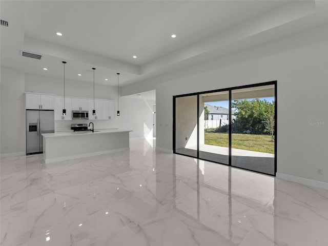 unfurnished living room featuring recessed lighting, a sink, visible vents, baseboards, and marble finish floor