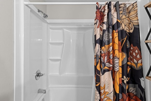 full bathroom featuring shower / bath combo with shower curtain