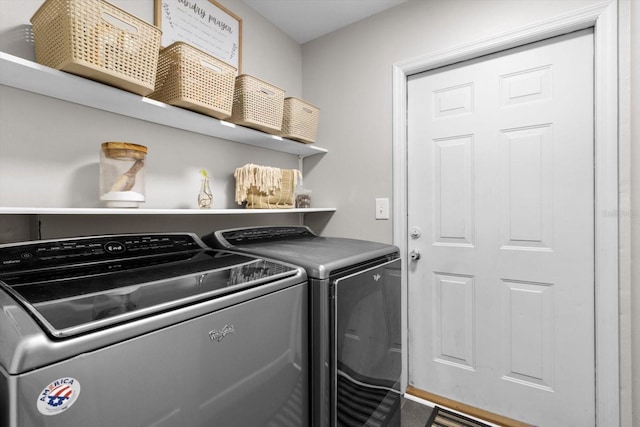 laundry room with laundry area and washing machine and dryer