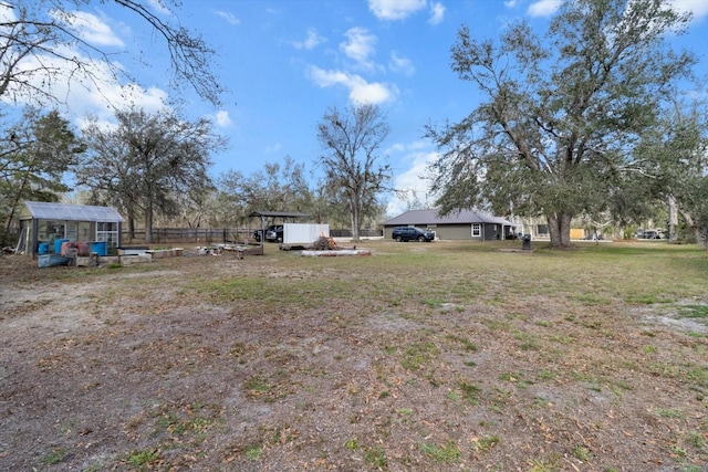 view of yard featuring a carport