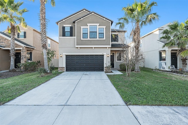 view of front of property with a garage, a front lawn, concrete driveway, and stucco siding