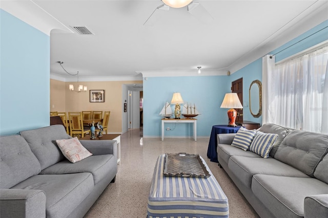 living room with baseboards, visible vents, crown molding, light speckled floor, and ceiling fan with notable chandelier