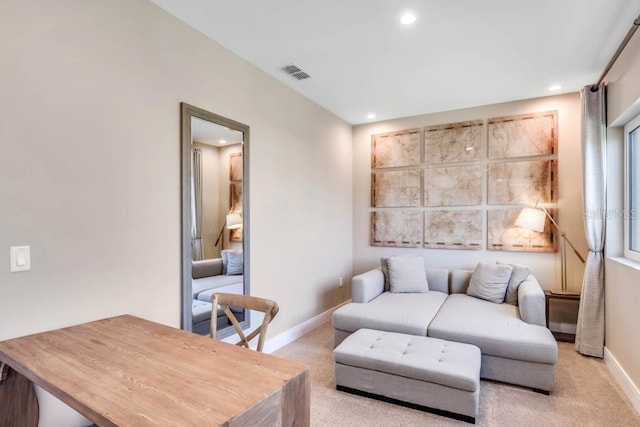 living area featuring light carpet, recessed lighting, visible vents, and baseboards