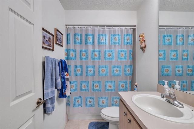 full bathroom with toilet, a textured ceiling, vanity, and tile patterned floors