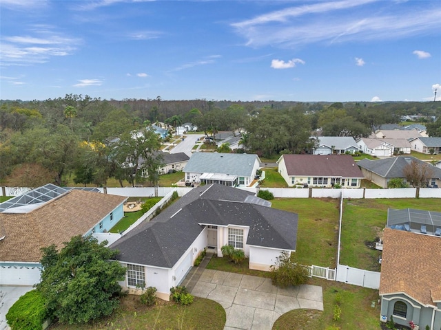 birds eye view of property with a residential view