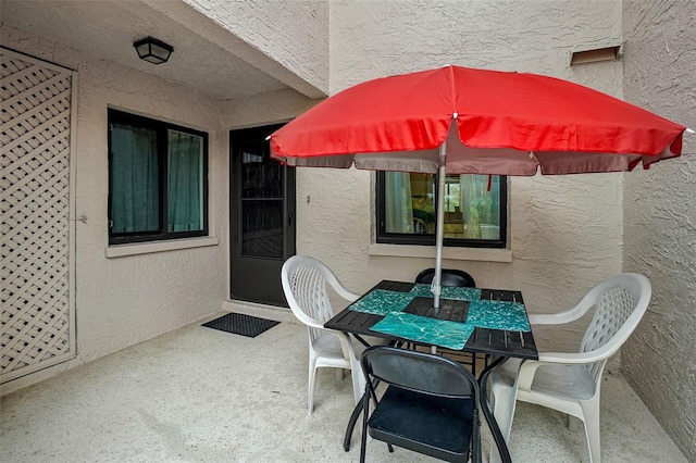 view of patio with outdoor dining area