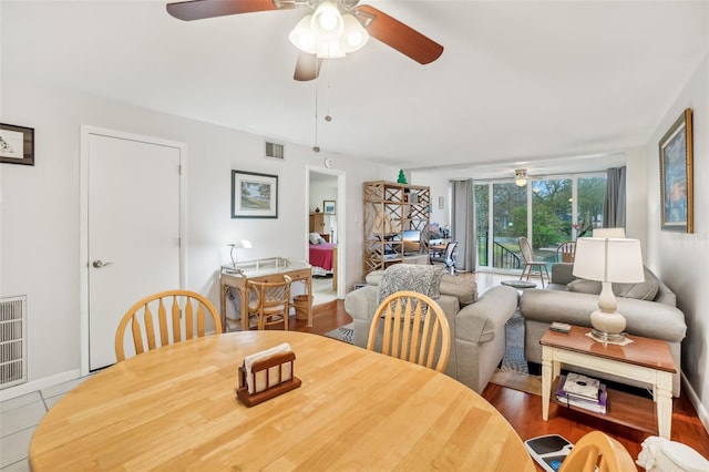 dining room featuring visible vents