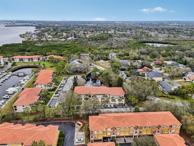 bird's eye view with a water view and a residential view