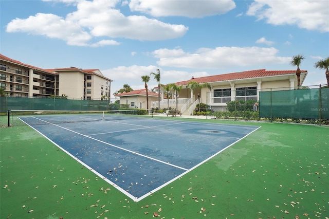 view of sport court with fence