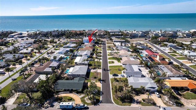 aerial view with a water view and a residential view