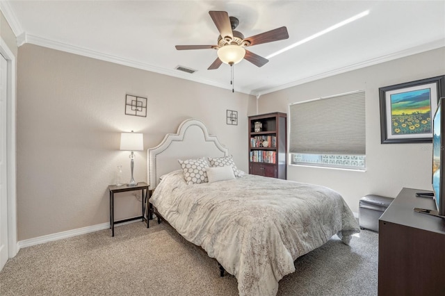 bedroom featuring ceiling fan, light carpet, visible vents, baseboards, and ornamental molding