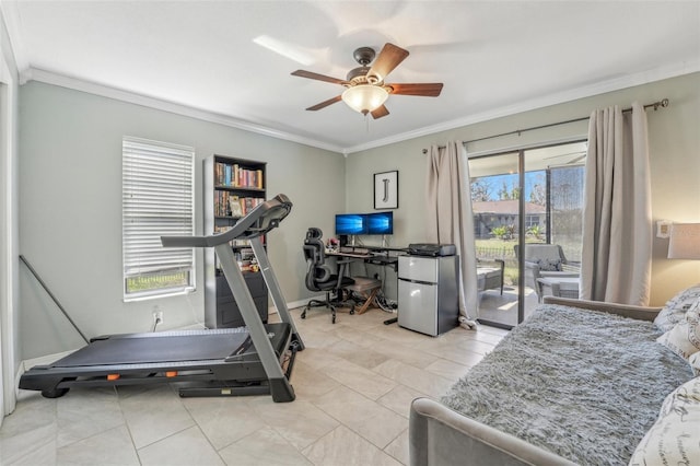 workout room with ornamental molding, baseboards, and a ceiling fan