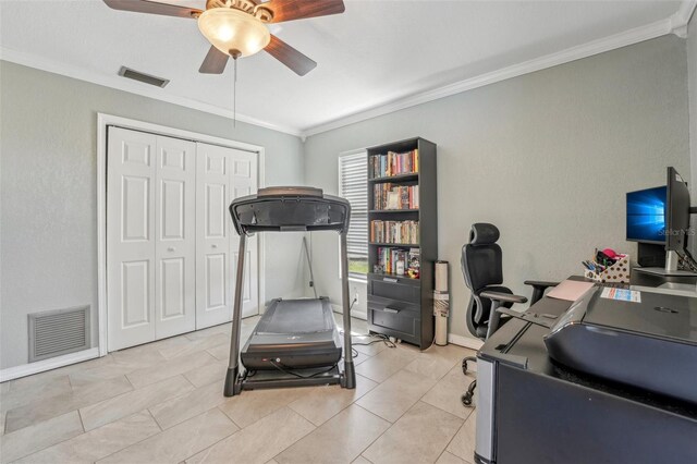 workout area featuring ornamental molding, visible vents, and a ceiling fan