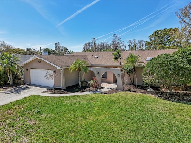 ranch-style house with an attached garage, stucco siding, concrete driveway, and a front yard