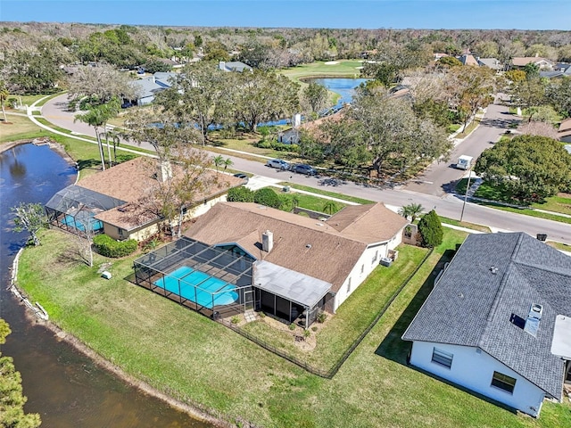 birds eye view of property featuring a residential view and a water view