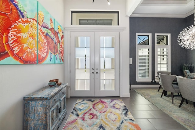 doorway with french doors and tile patterned floors