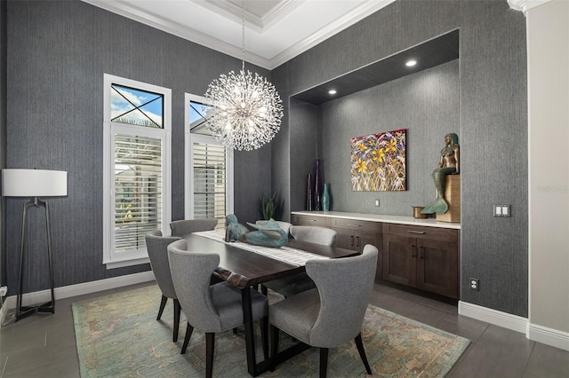 dining area featuring baseboards, wallpapered walls, ornamental molding, and an inviting chandelier