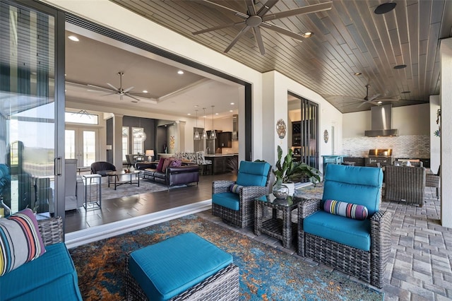 view of patio with a ceiling fan and an outdoor hangout area