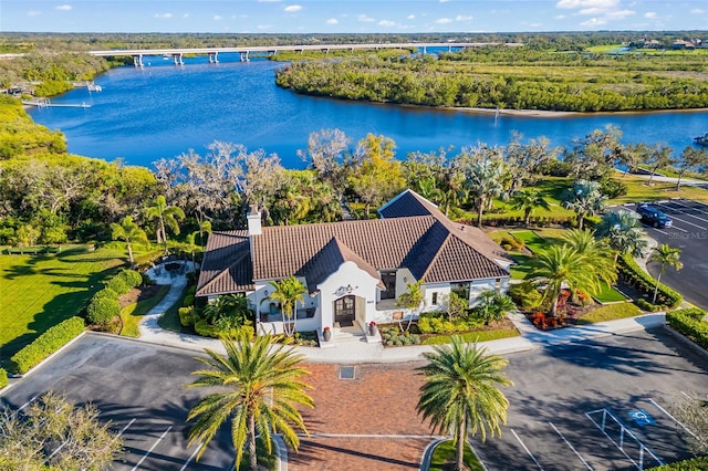 bird's eye view with a water view