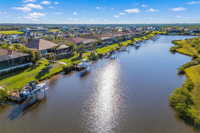 aerial view featuring a residential view and a water view