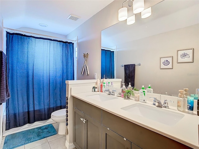 full bathroom featuring tile patterned floors, toilet, visible vents, and a sink