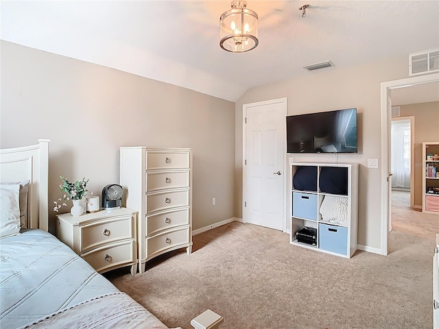 carpeted bedroom featuring visible vents, baseboards, and lofted ceiling