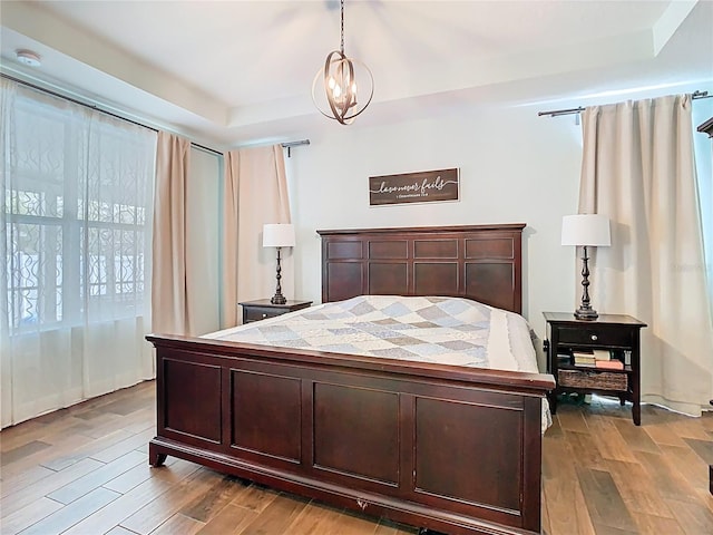 bedroom featuring wood finished floors