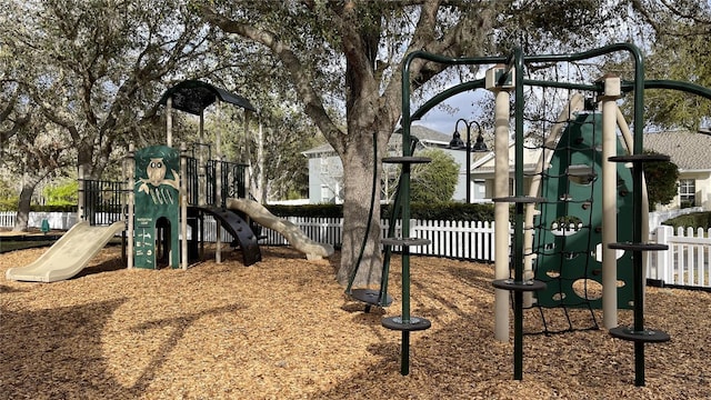 community jungle gym with fence