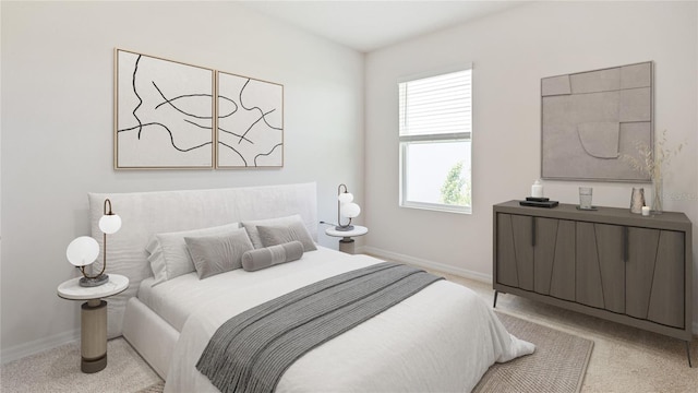 bedroom featuring baseboards and light colored carpet