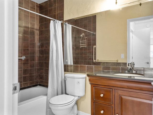 bathroom with shower / tub combo, vanity, and toilet