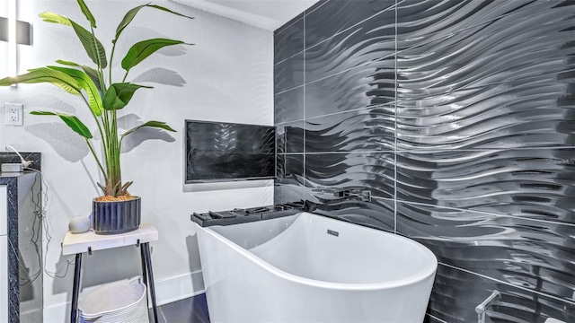 855 Bayway Blvd Unit 105, Clearwater, FL 33767 - bathroom featuring a freestanding bath