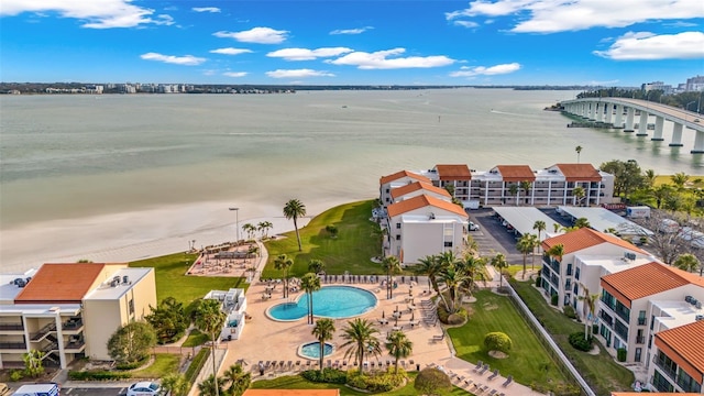 855 Bayway Blvd Unit 105, Clearwater, FL 33767 - drone / aerial view of a large body of water and a pool area