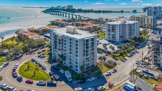 855 Bayway Blvd Unit 105, Clearwater, FL 33767 - view of urban area featuring apartment complex / building, a nearby body of water, and a notable bridge