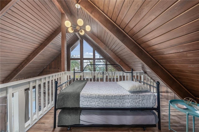 unfurnished bedroom featuring vaulted ceiling with beams, wood finished floors, and wood ceiling