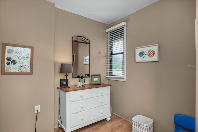 bedroom featuring light wood-style floors