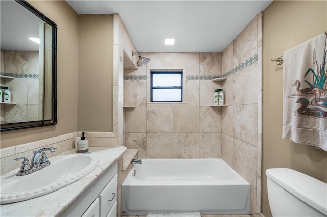 bathroom with  shower combination, vanity, and toilet