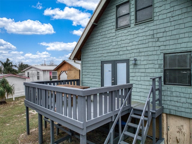 back of house featuring a wooden deck