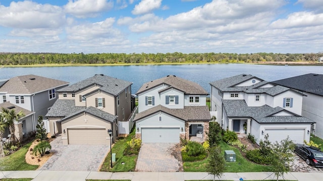 exterior space with a water view and a residential view