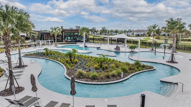 view of pool with fence