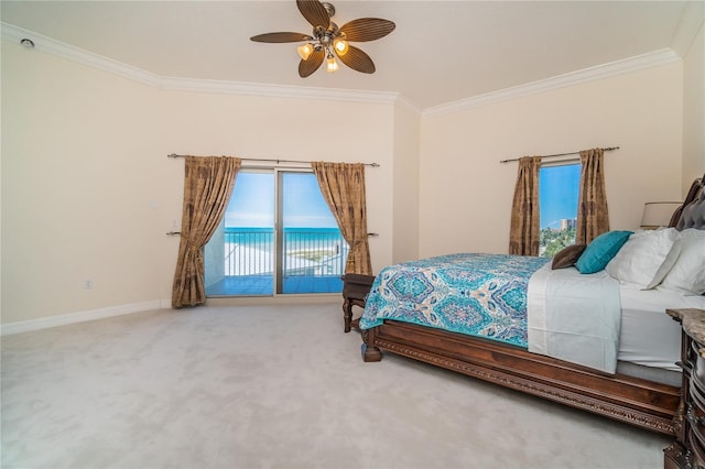 bedroom with baseboards, ornamental molding, carpet, and access to exterior