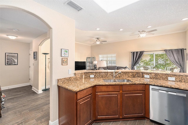 kitchen featuring a healthy amount of sunlight, visible vents, a sink, and stainless steel dishwasher