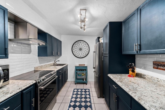 kitchen featuring light tile patterned floors, stainless steel microwave, backsplash, electric range oven, and a sink