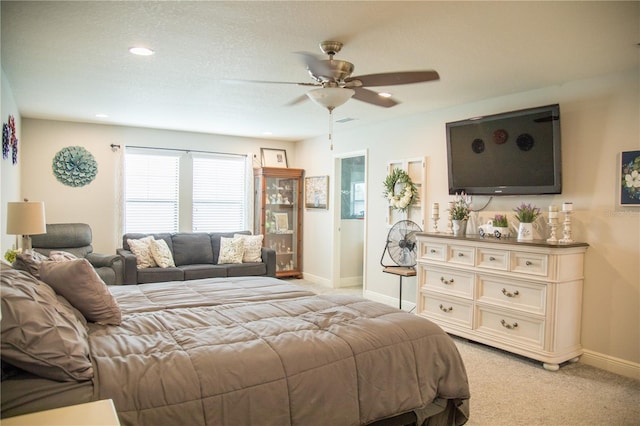 bedroom with light carpet, visible vents, baseboards, a ceiling fan, and recessed lighting